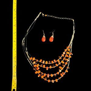 Beautiful Orange beaded necklace and matching earrings